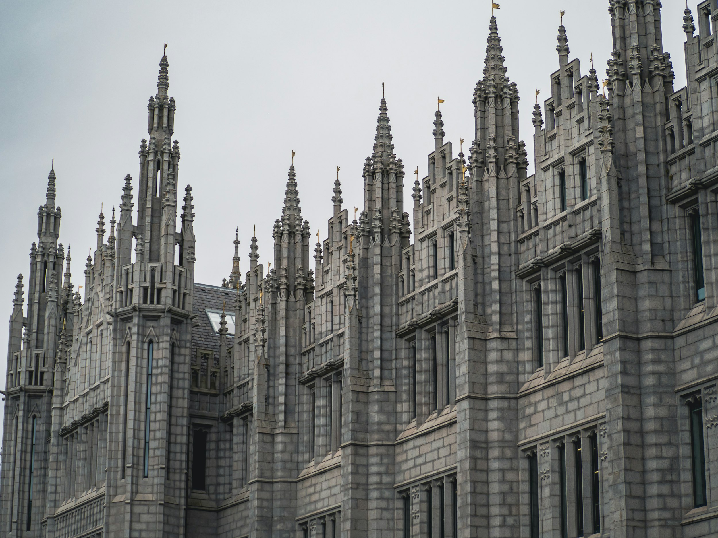 A large building with a clock on the front of it