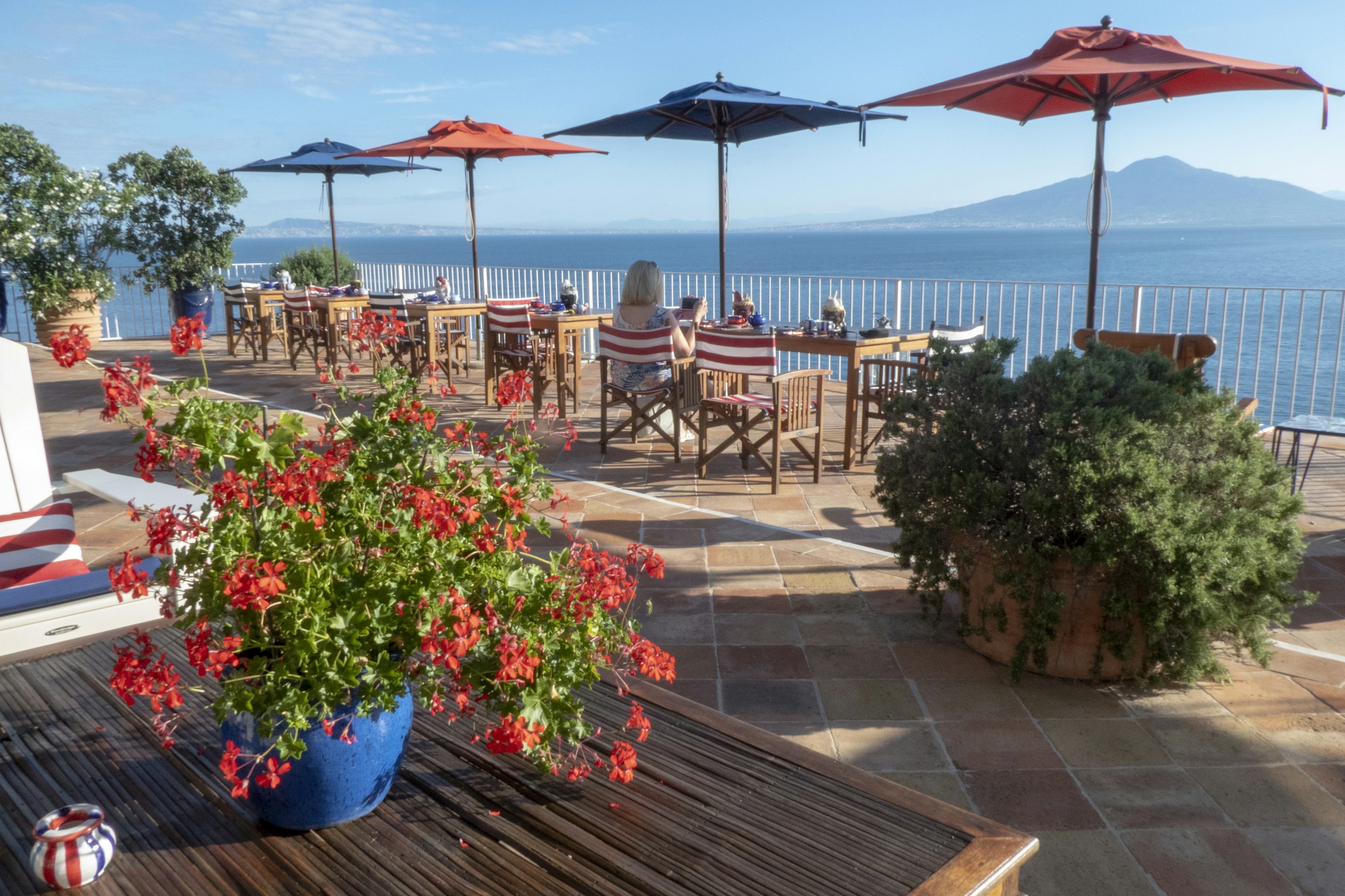 two blue and red patio umbrellas