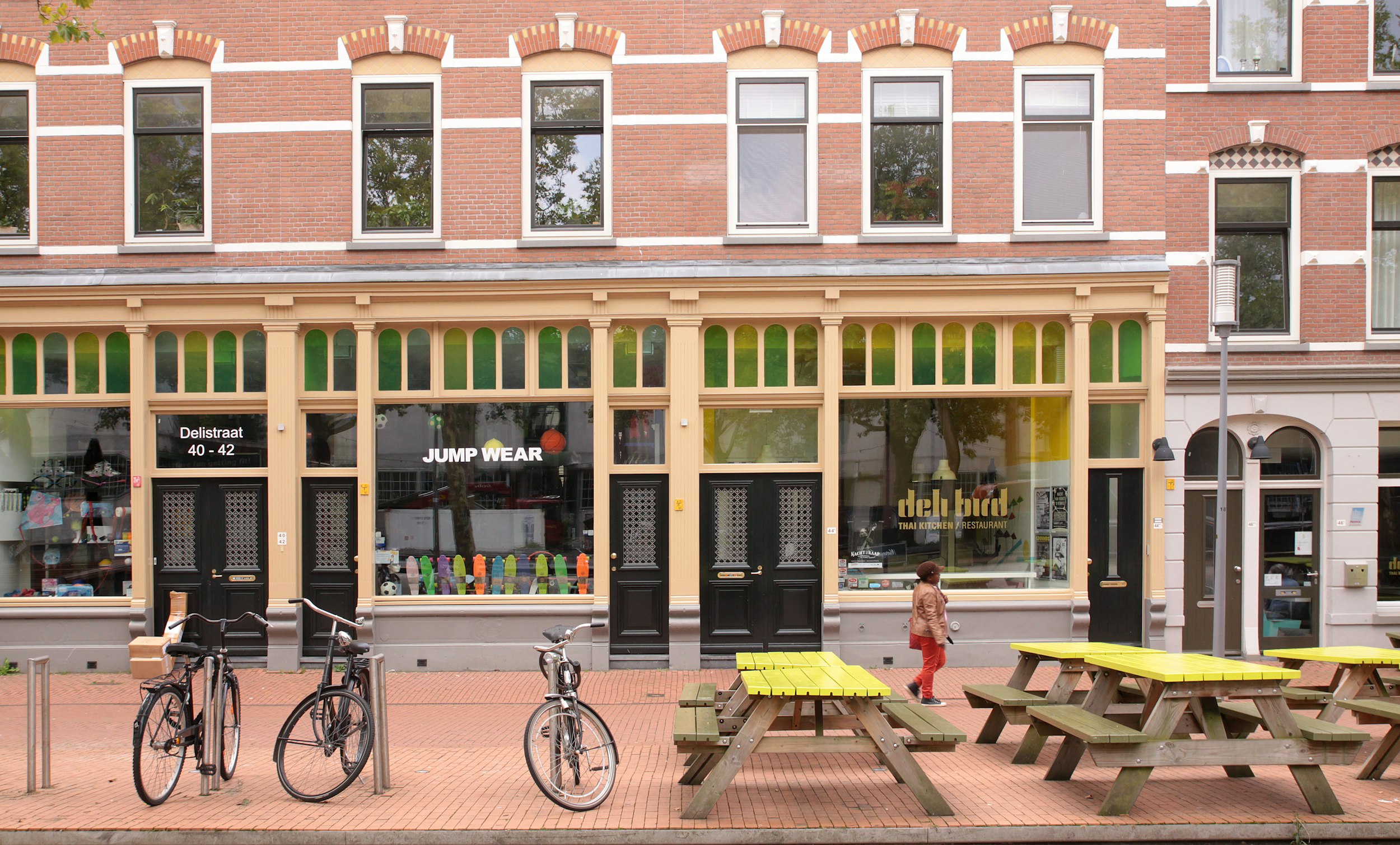 a couple of bikes are parked outside of a store