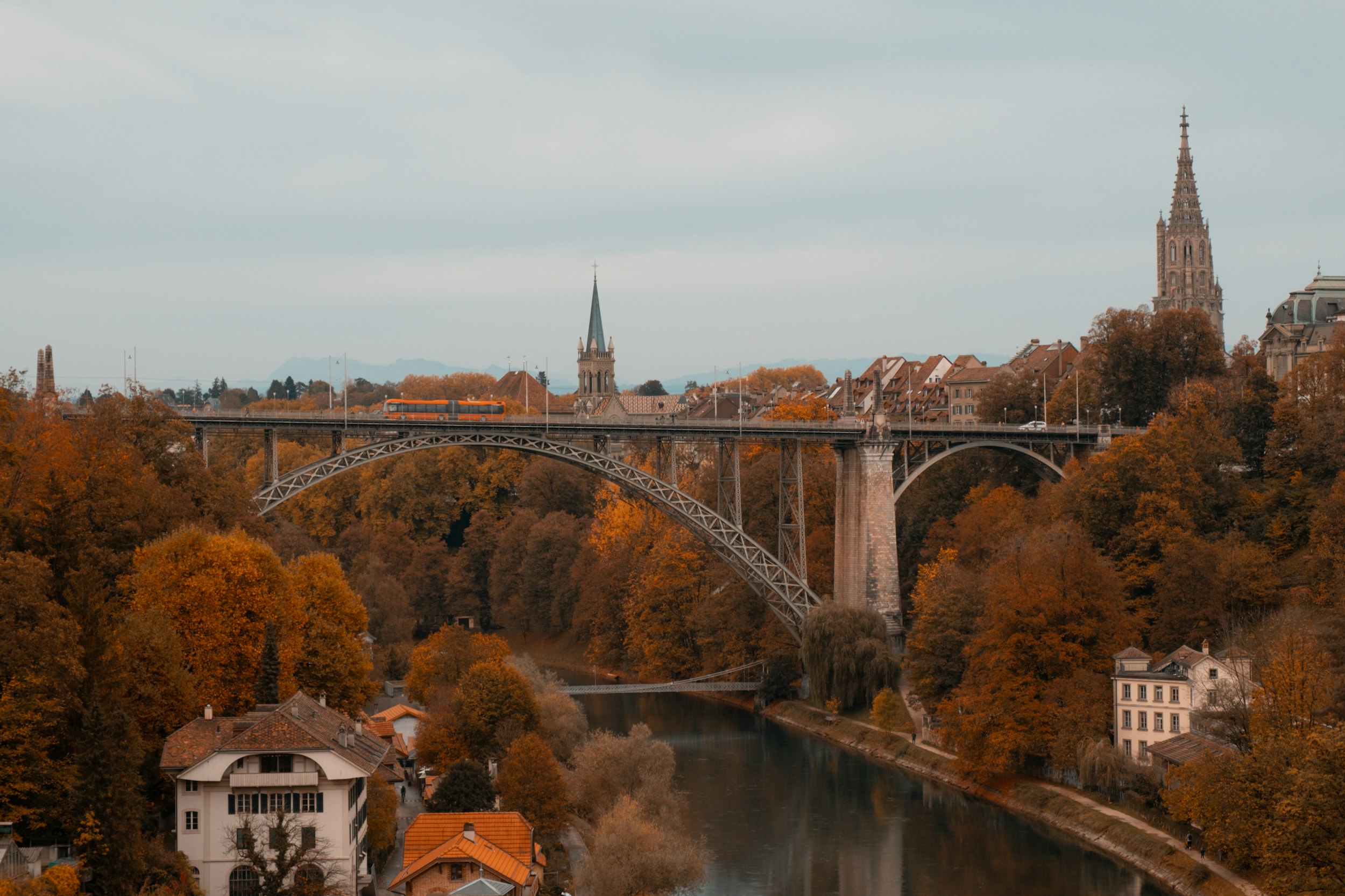 A view of a bridge over a river in a city