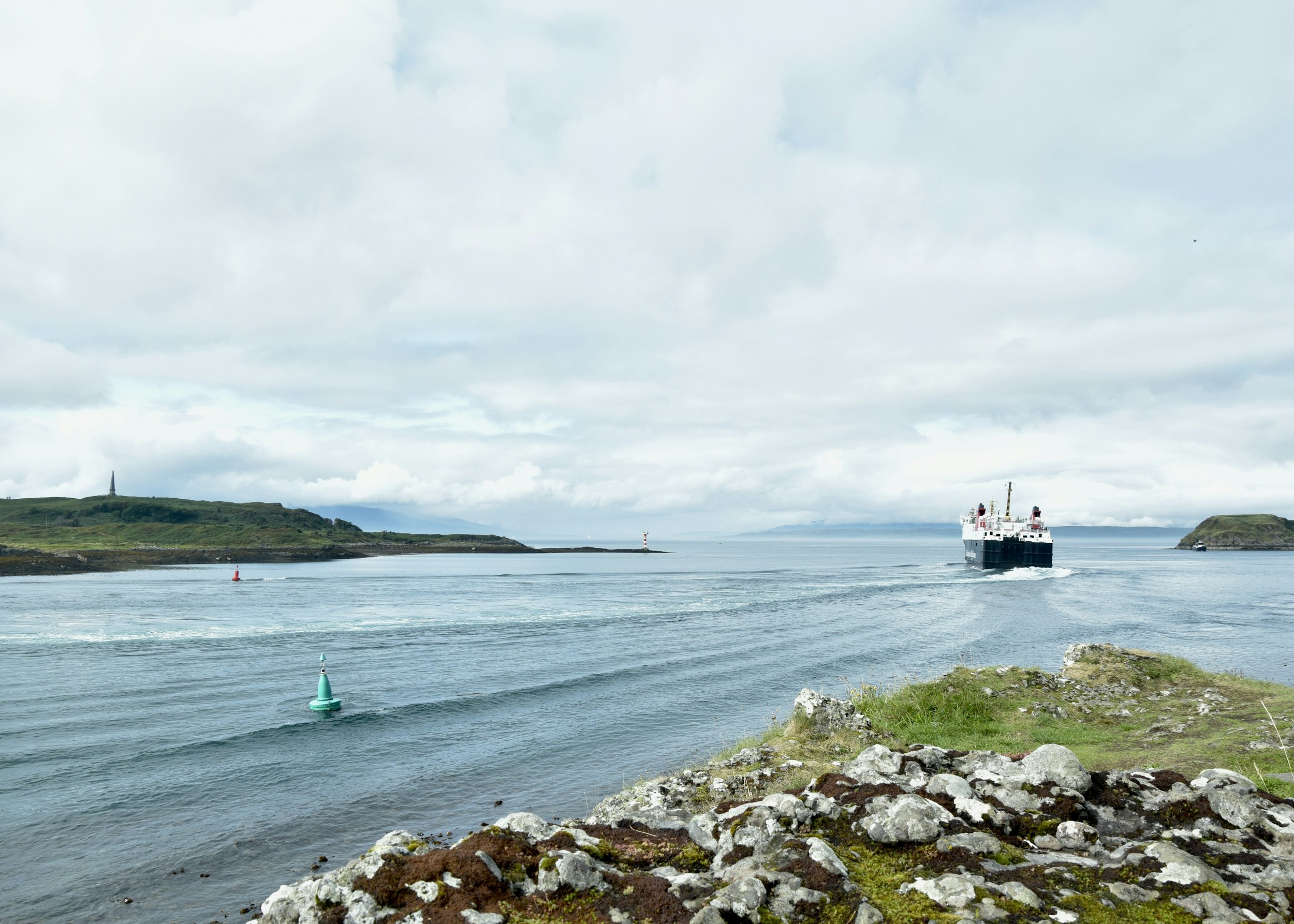 a large boat traveling across a large body of water