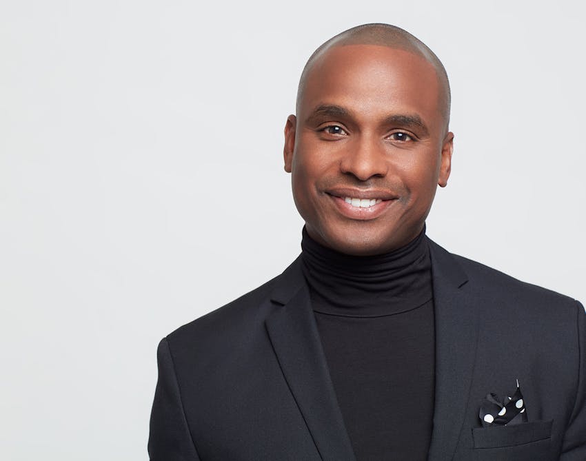 Lampert MD patient in a black shirt and suit