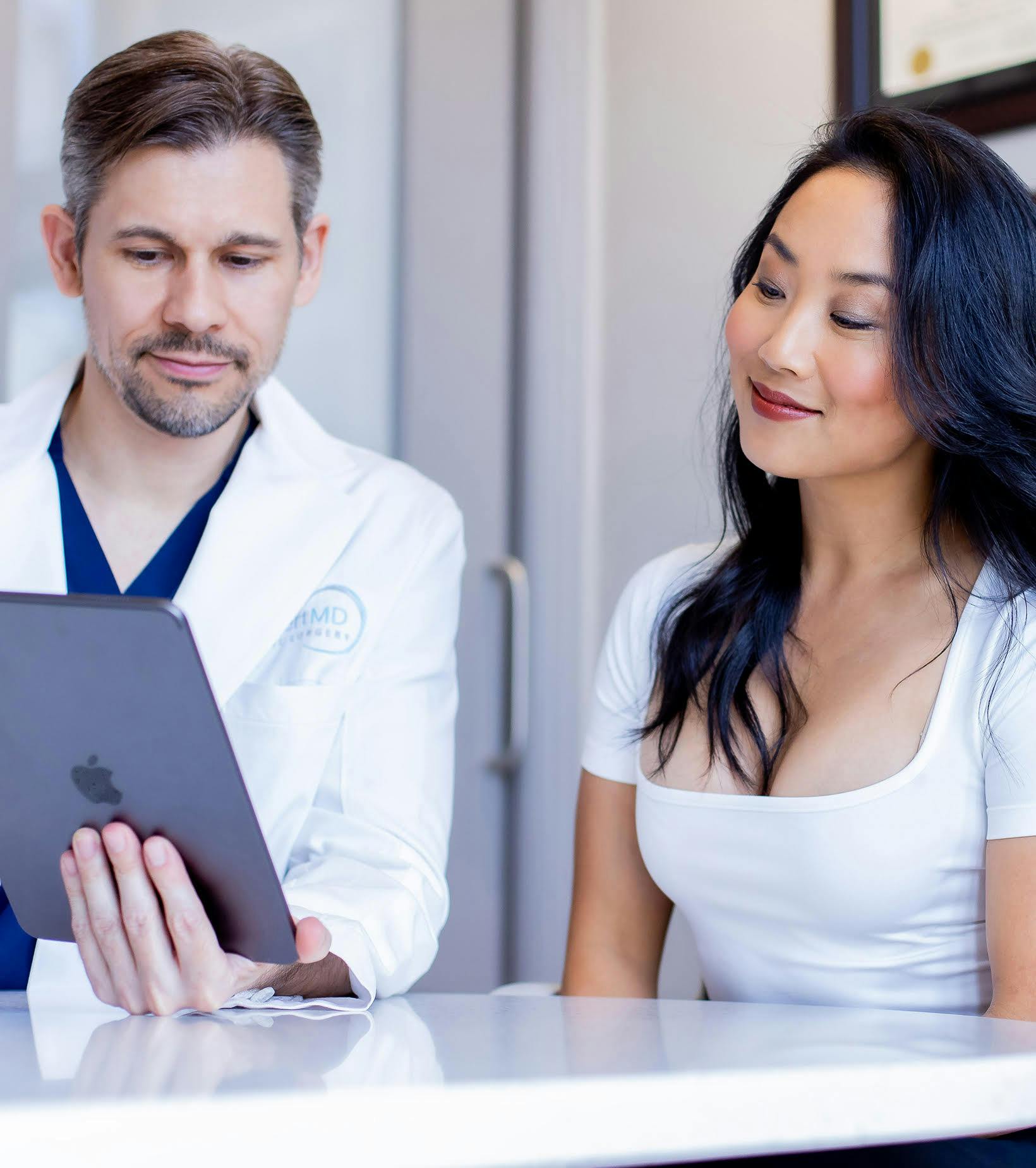 Dr. Lampert speaking with a female patient