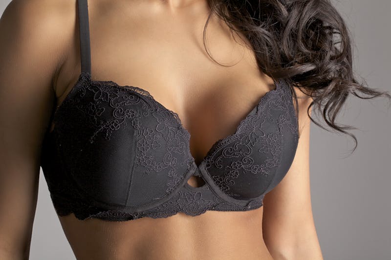 woman in a black bra