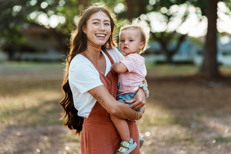 Woman holding her baby