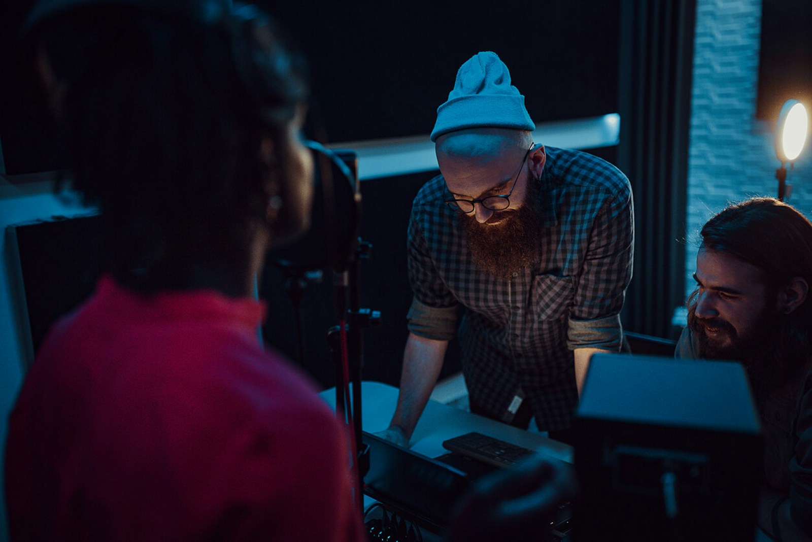Group of Artists Working together to Write and Record New MusicArtist Writing New Music in the Studio