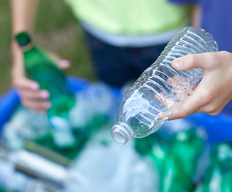Sorting bottles at Suez Recycling Centre