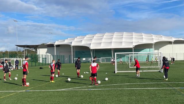 Students training on one of the pitches at St. George's Park