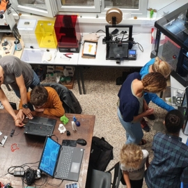 People using the equipment in the FabLab