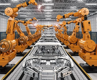 Robots build cars in an automobile factory