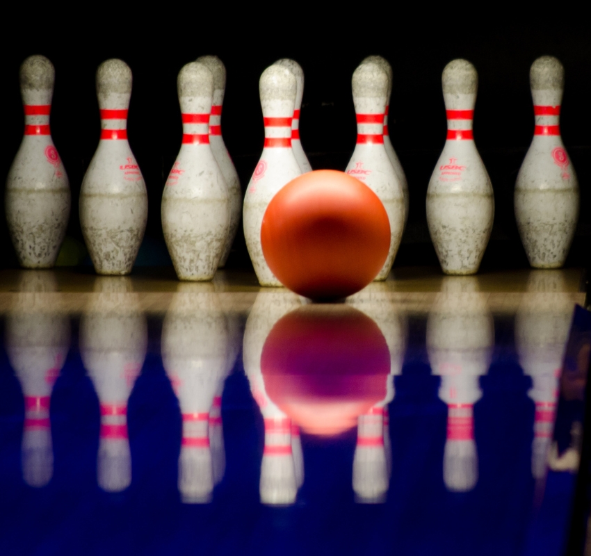 Bowling ball and skittles