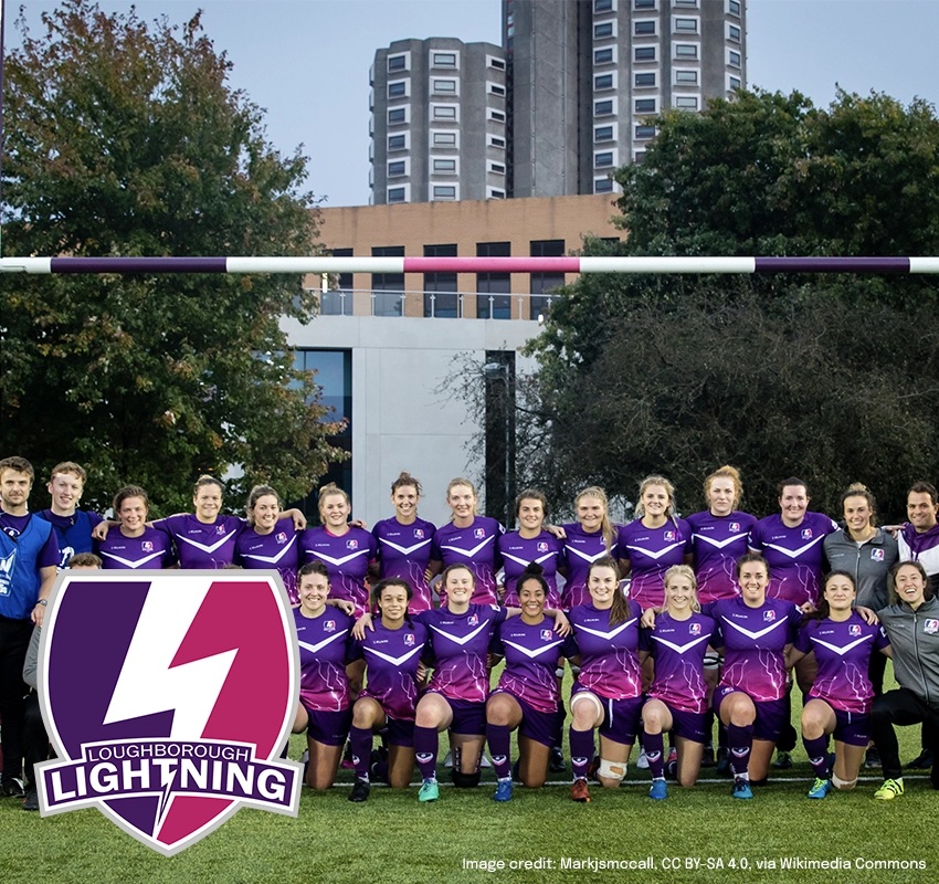 Loughborough Lightning team gathered together for a team photo, wearing purple and pink home kits