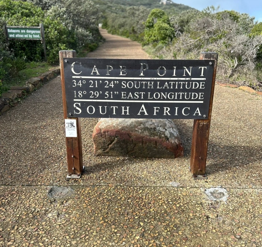 Sign designating Cape Point and showing its latitude and longitude