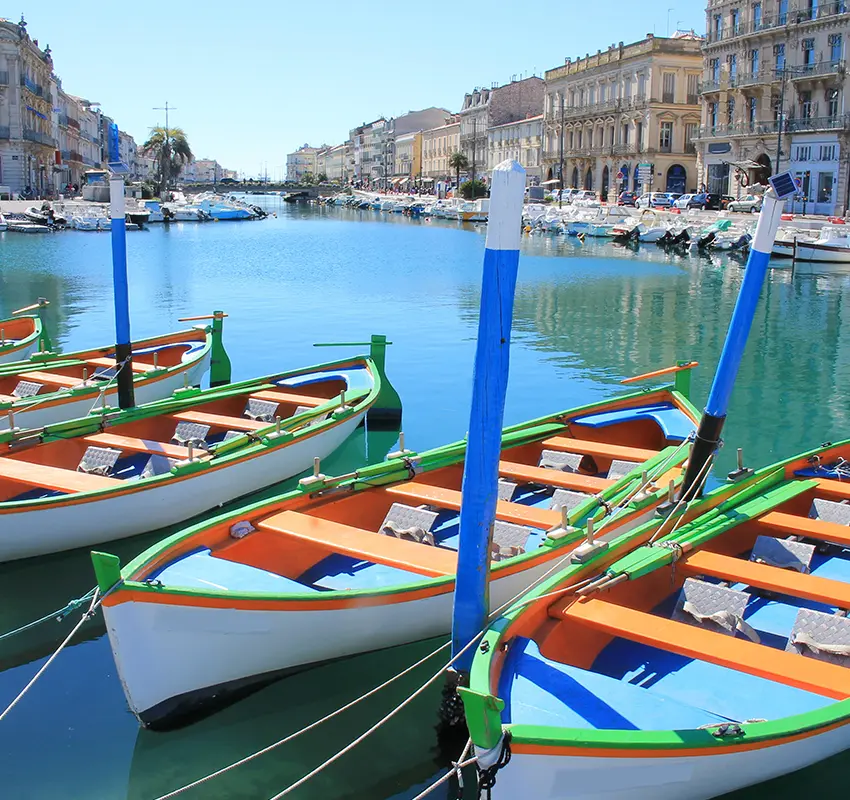 Boats moored along the canal in Sète