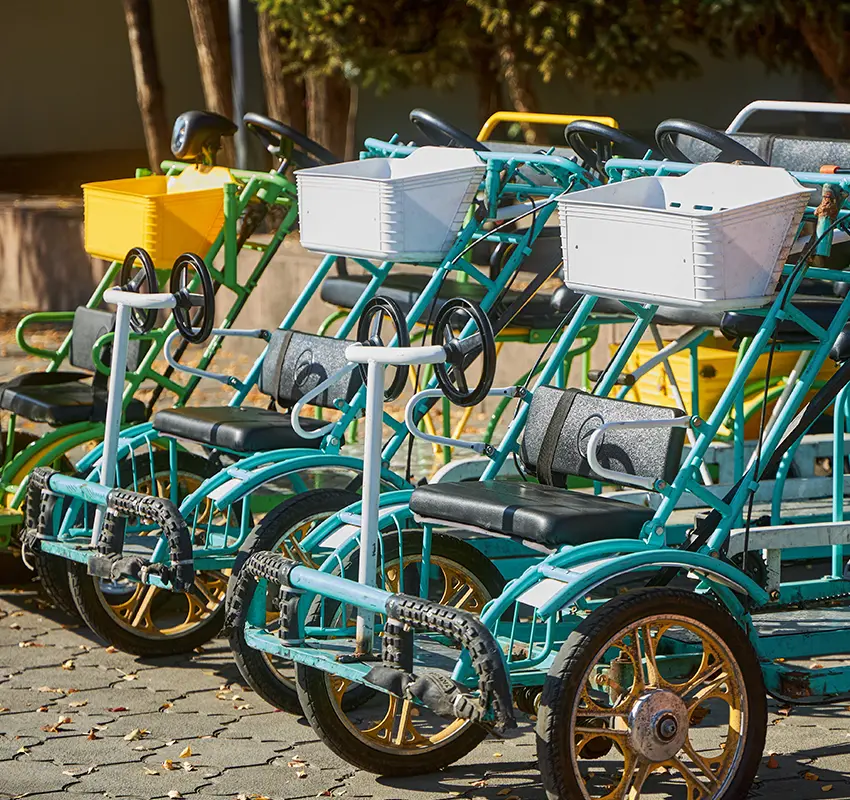 People on quadricycle