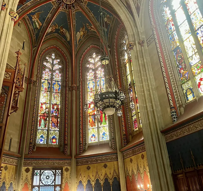 Stained glass windows and highly decorated ceiling of St Peter's Cathedral, Geneva
