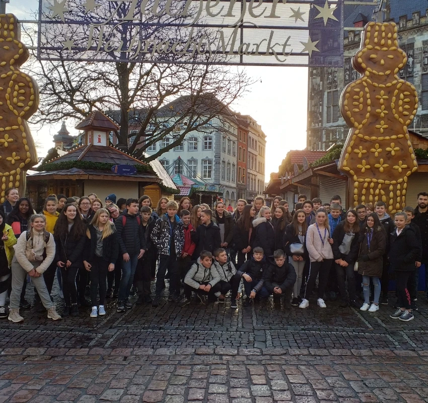 Image of a group of school children at the entrance to Aachen Christmas Market