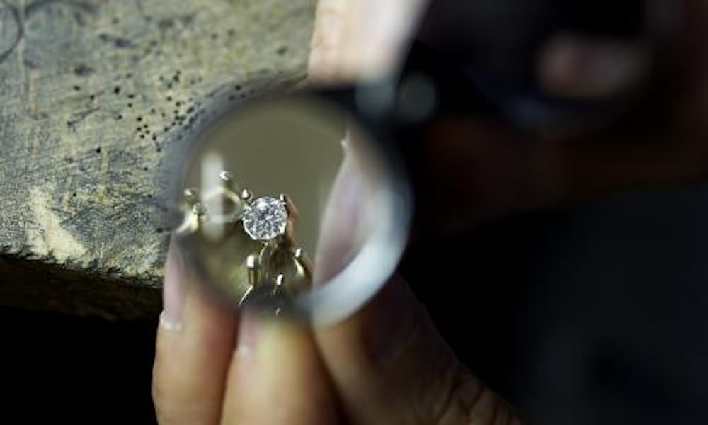 focus of a detail of  a ring with diamond