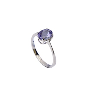 Tanzanite ring on a white background