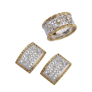 Florentine-style ring and earrings on a white background