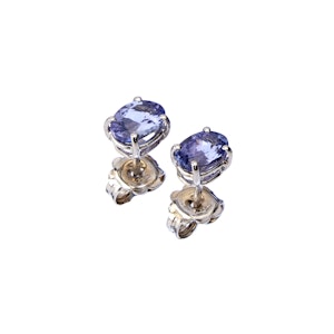 Tanzanite earrings on a white background