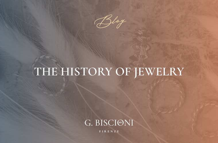 cover blog post about the history of jewelry with Biscioni's logo and some jewels on the background