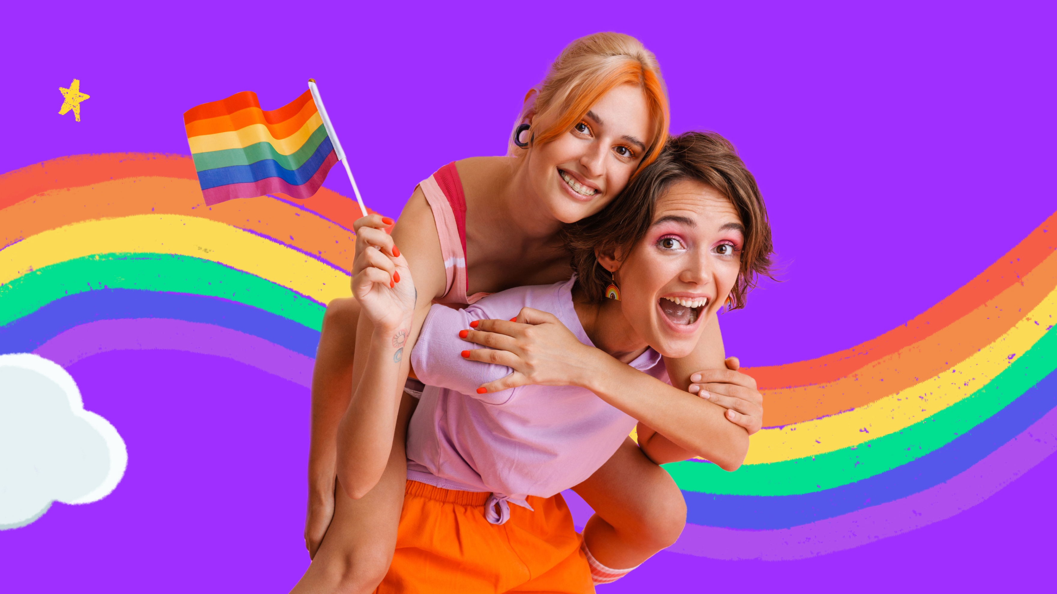 Two women holding small rainbow flag