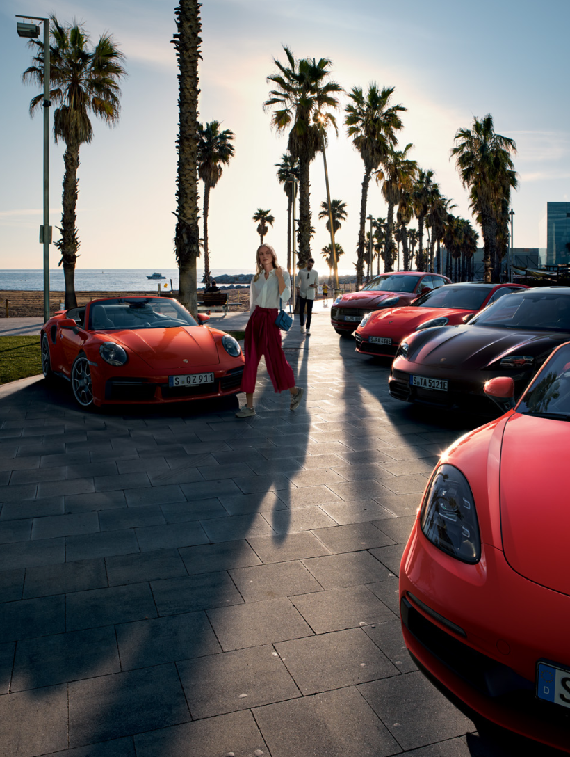 Parking lot full of Porsches