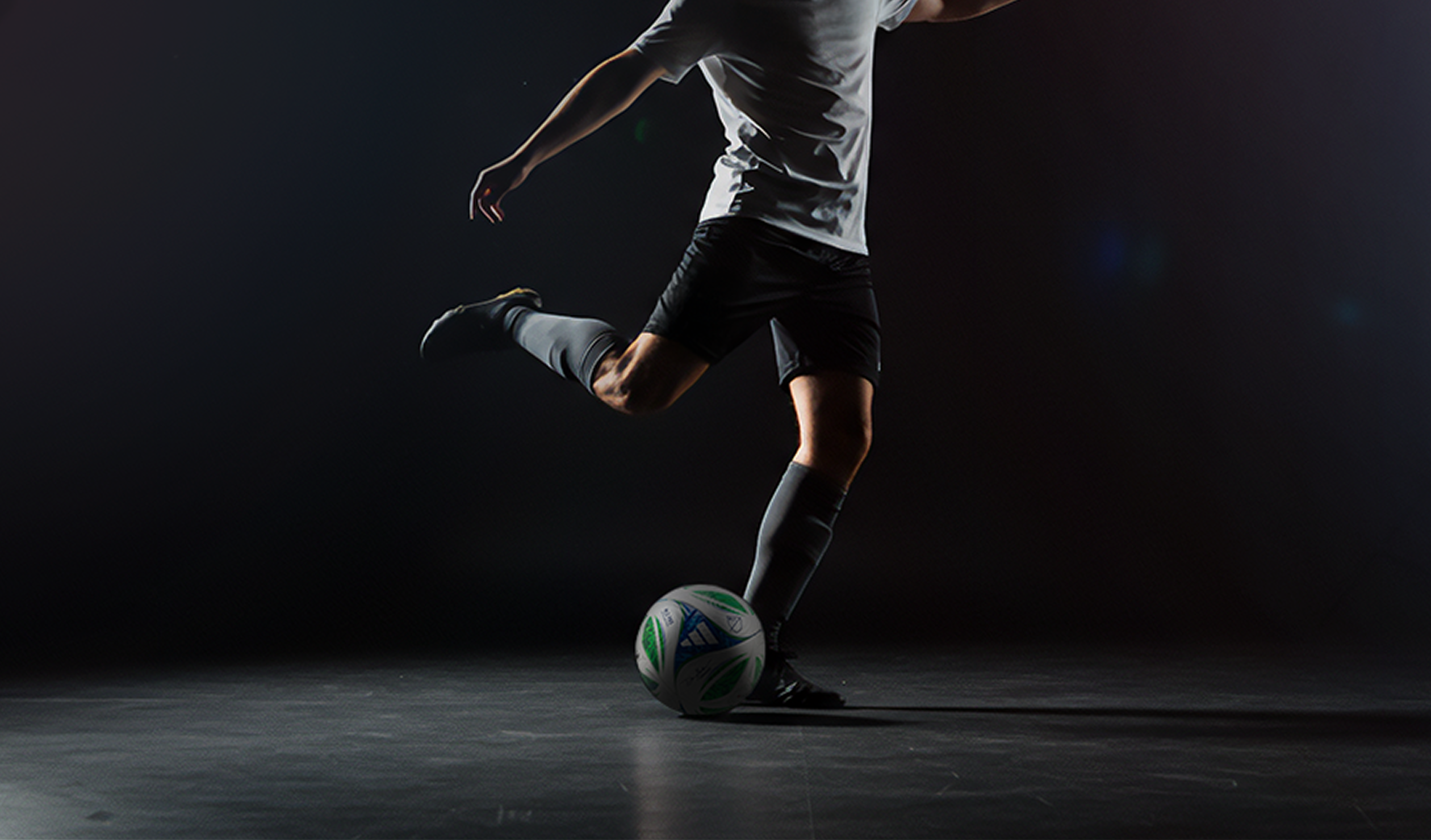 football player kicking the ball