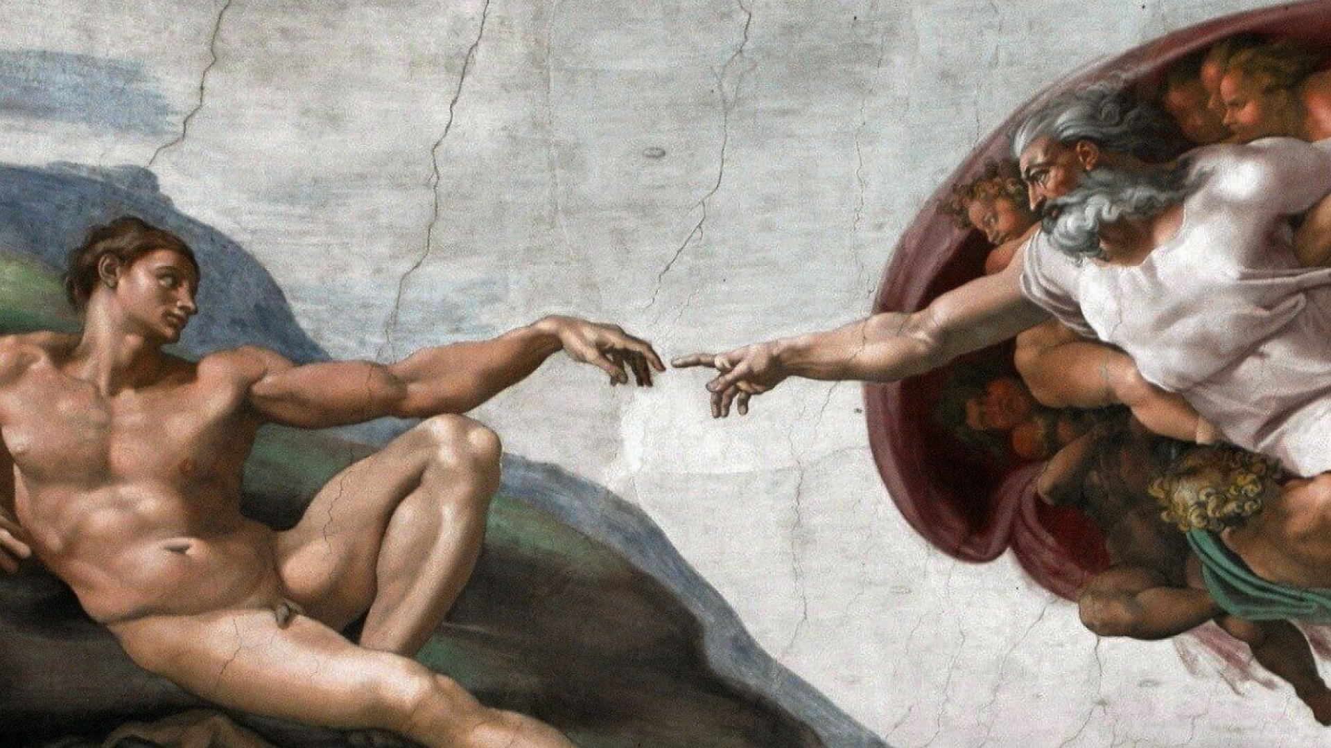 God reaching out to Adam in a moment of connection, surrounded by figures, in Michelangelo's "The Creation of Adam."