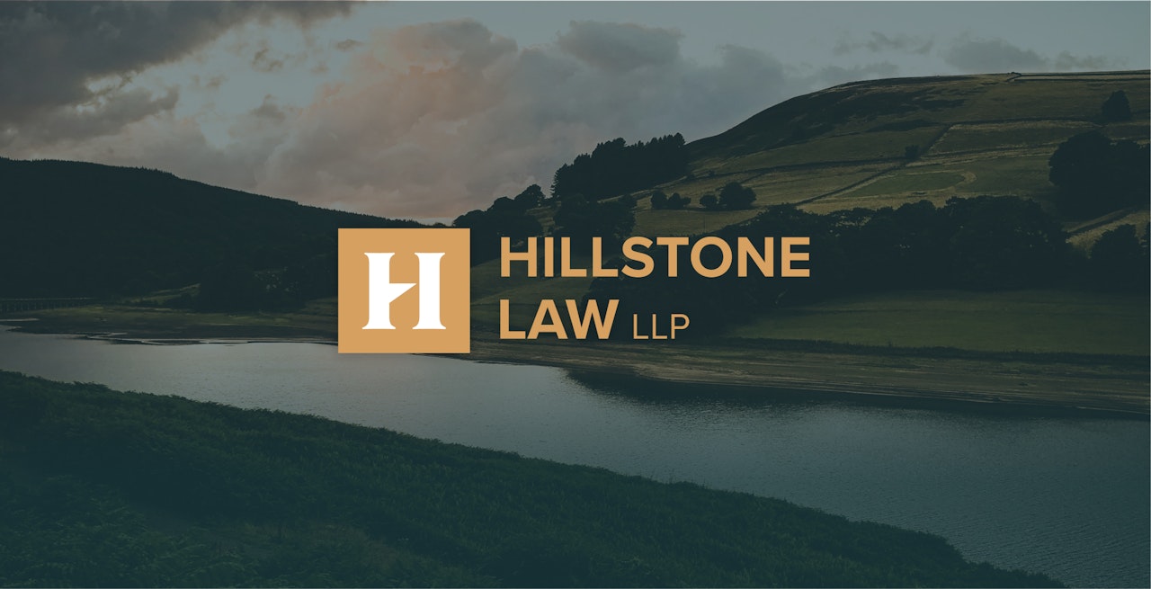 Logo for Hillstone Law over an image of fields. A project by Kozo Creative.