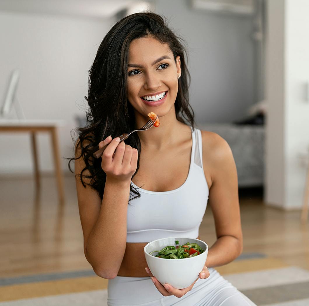 Woman eating a salad