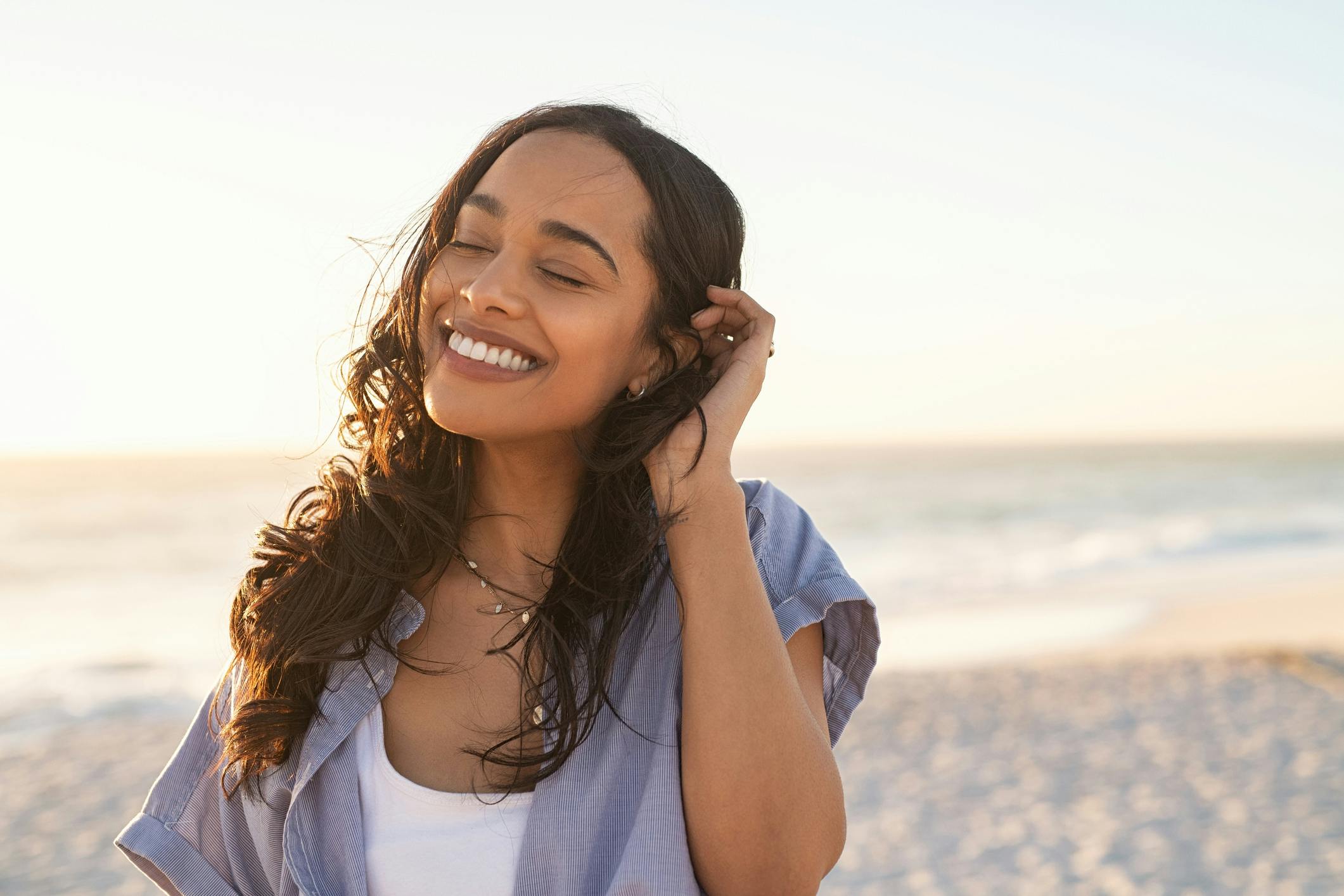 Woman smiling on the beach