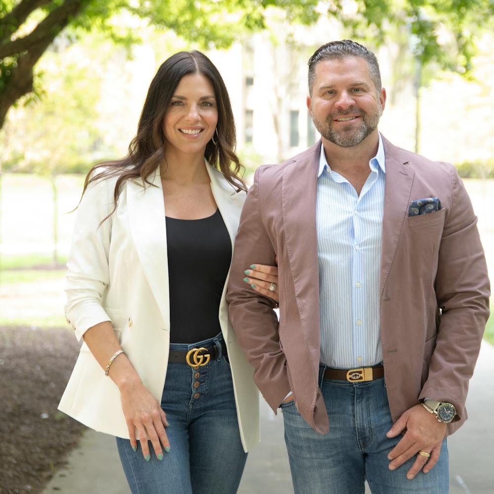 Woman and Man smiling at camera