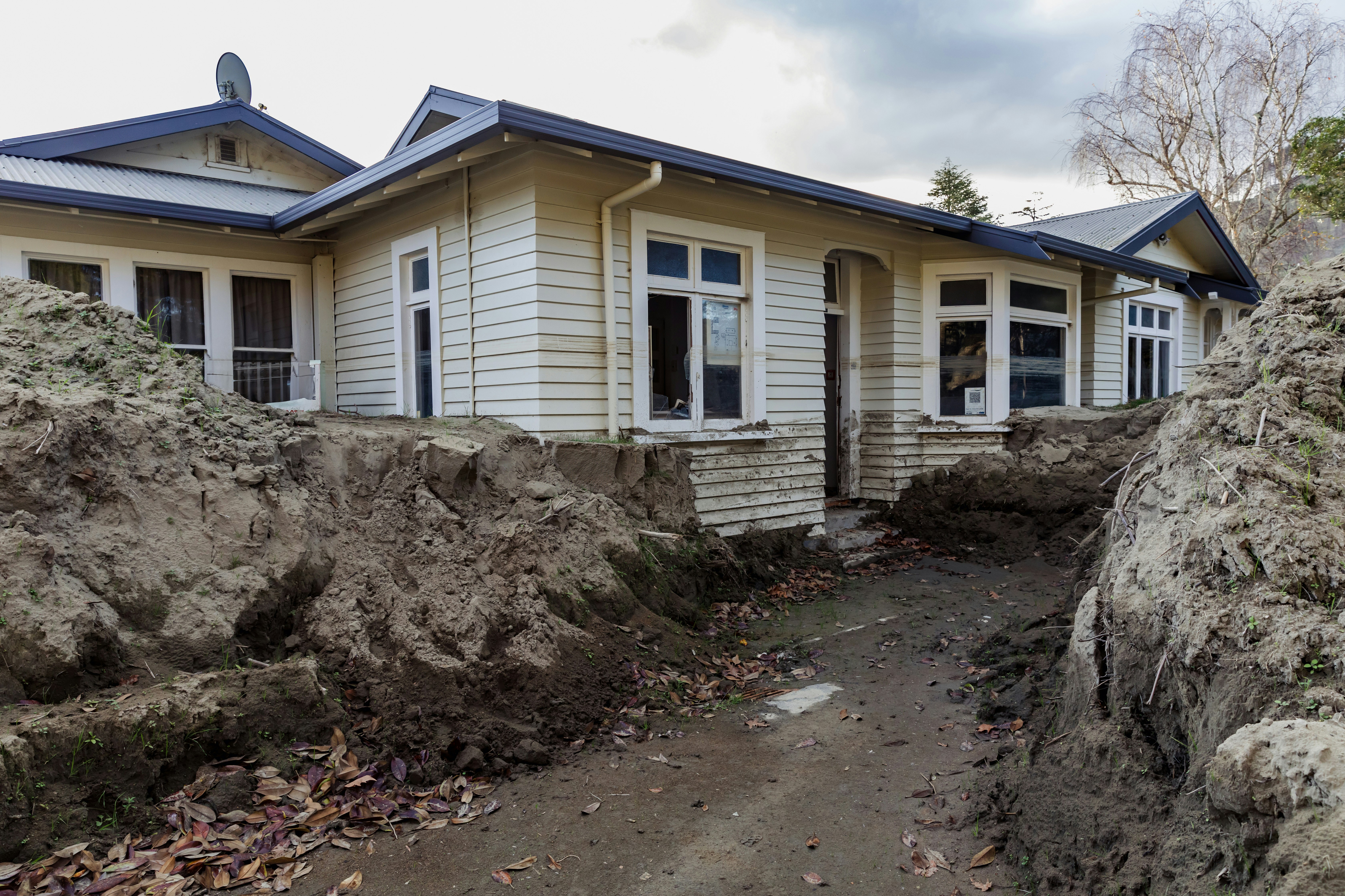 Silt and school house buried and damaged in the Cyclone Gabrielle natural disaster.