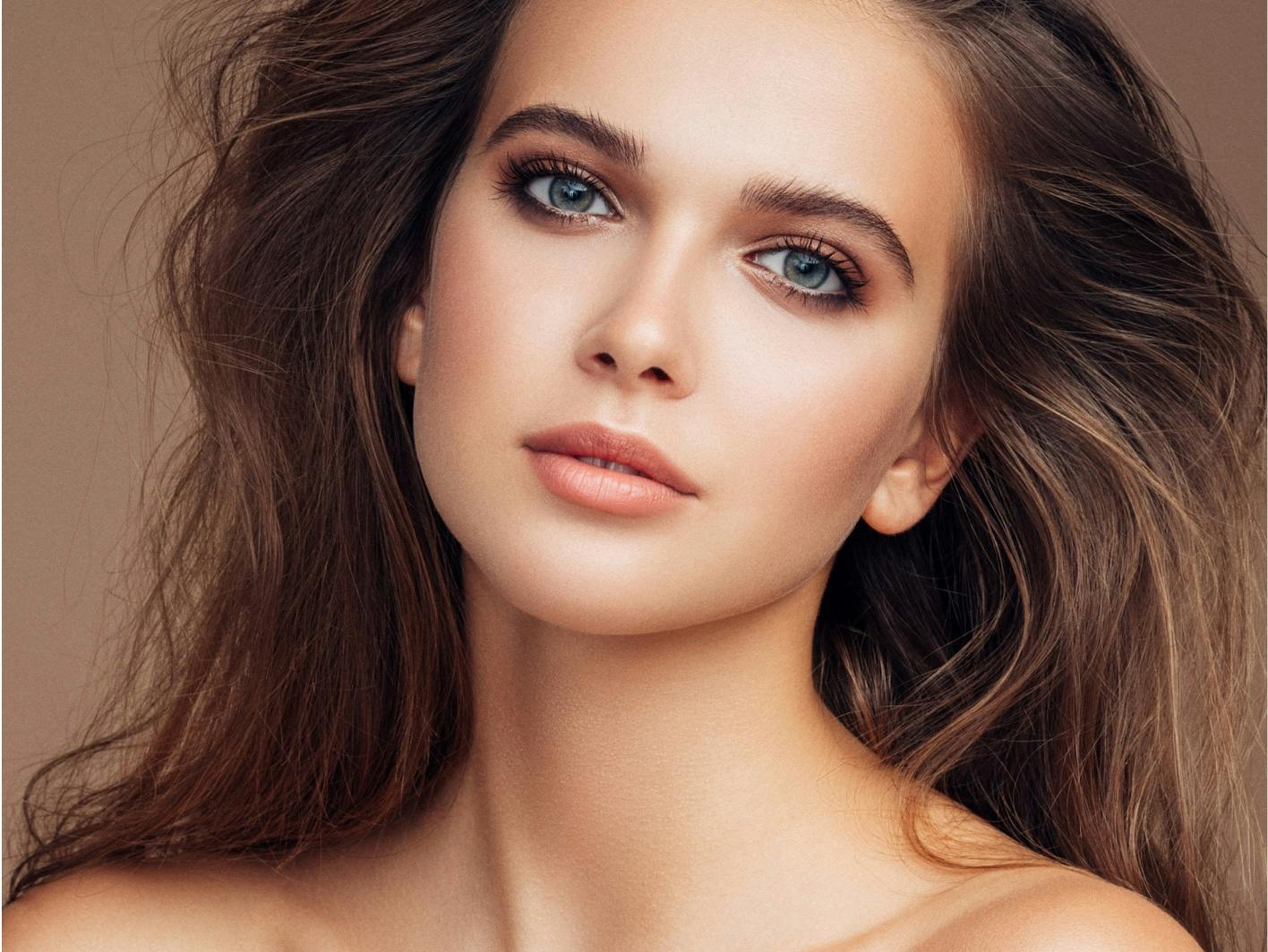 Closeup of a woman's face highlighting rhinoplasty in Upper East Side.