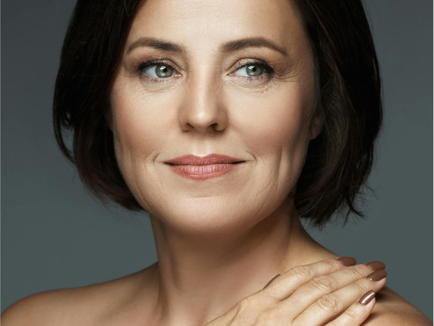 Middle aged woman showing blepharoplasty in Upper East Side.