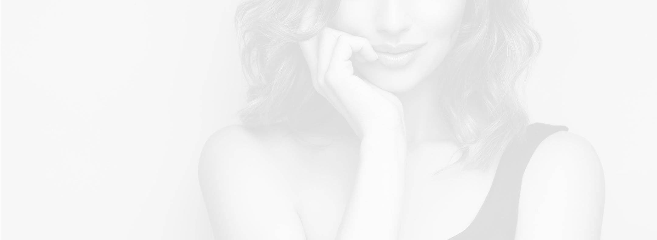 Faded Black And White photo of beautiful woman for background