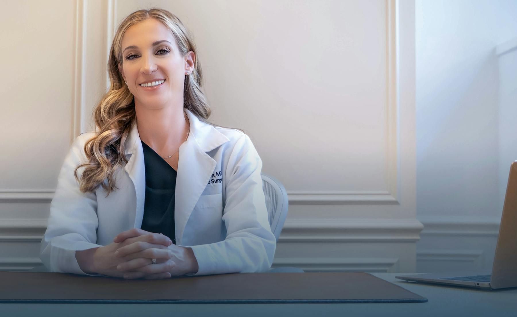 Shari Reitzen in a white coat