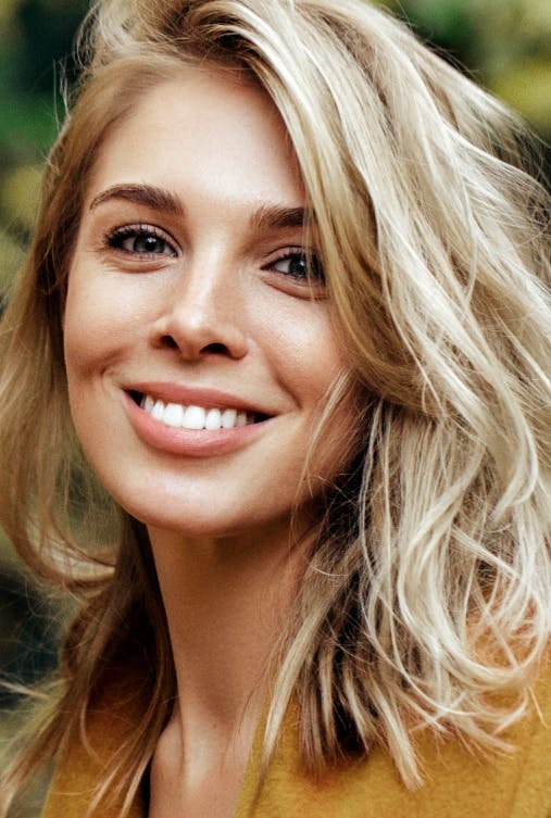 beautiful blonde woman smiling