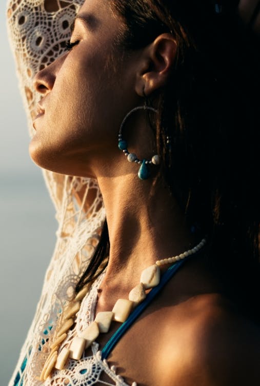 Beautiful bohemian model wearing jewelry.