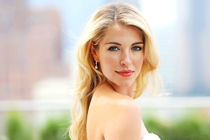 blond woman looking at the camera