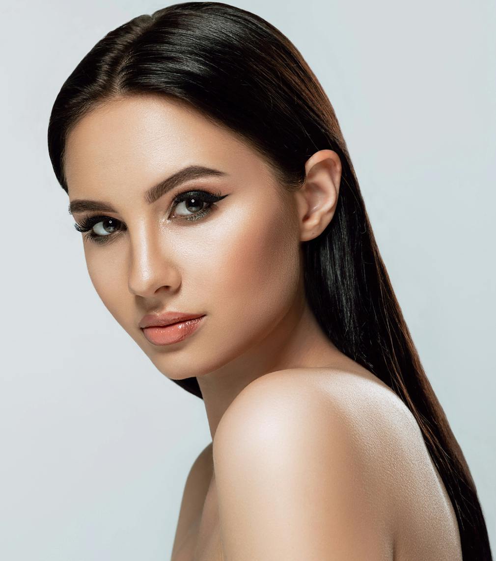 Woman with black hair posing