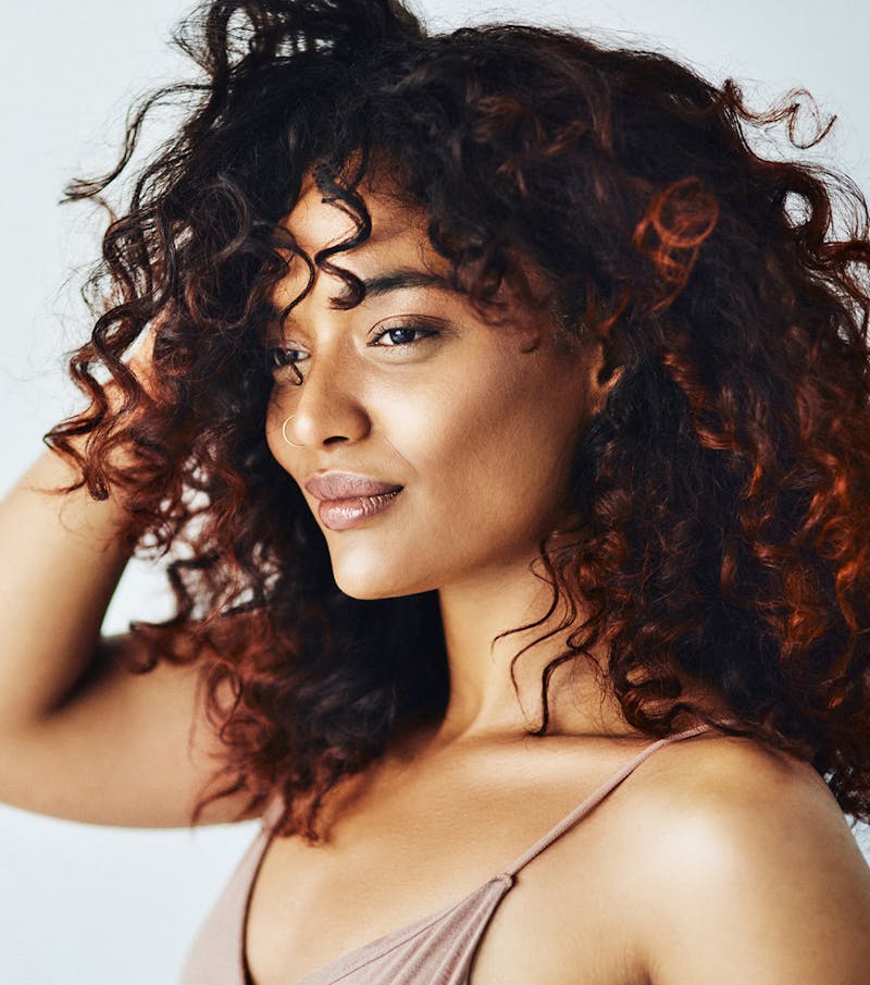 Side view of a woman's face highlighting dermal fillers in Glasgow.