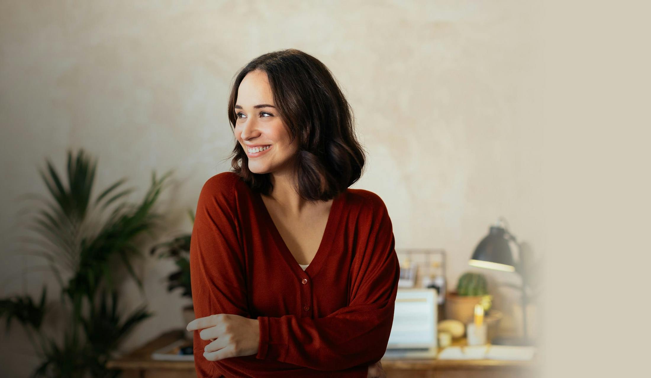 Woman in a red shirt posing