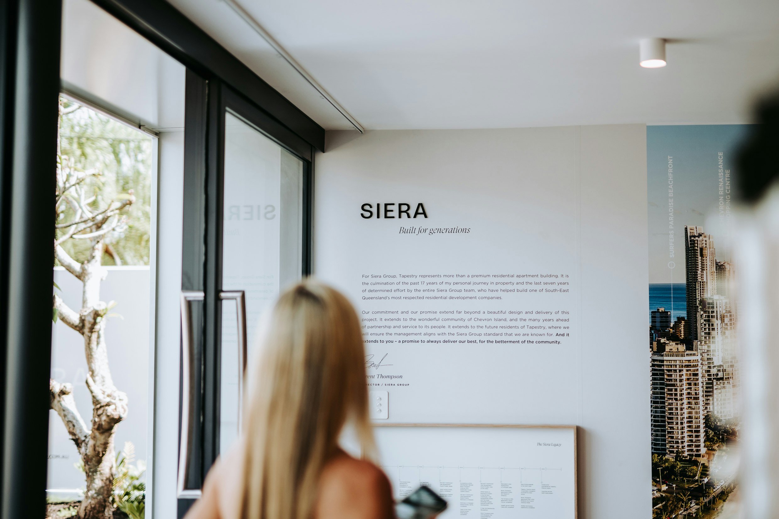 A buyer viewing project displays in the SIERA sales gallery