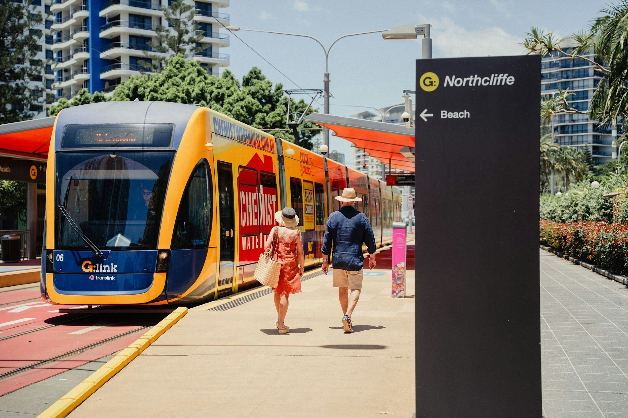 Couple at the Northcliffe light rail stop, Surfers Paradise