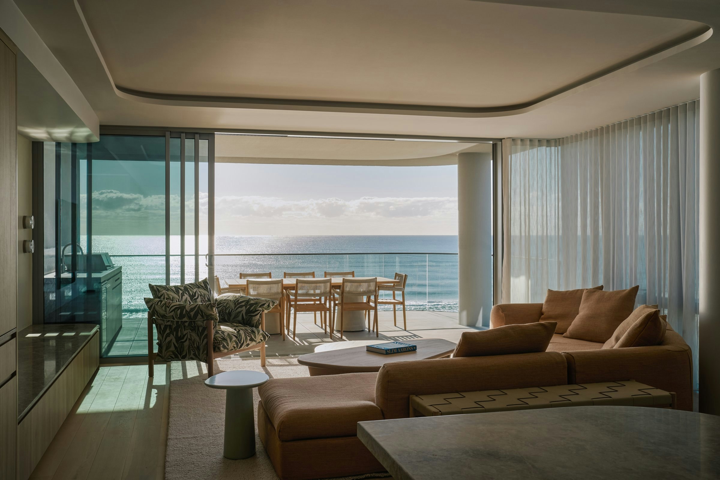 Living room at SIERA's PIPIS residences opening to the ocean at Bilinga