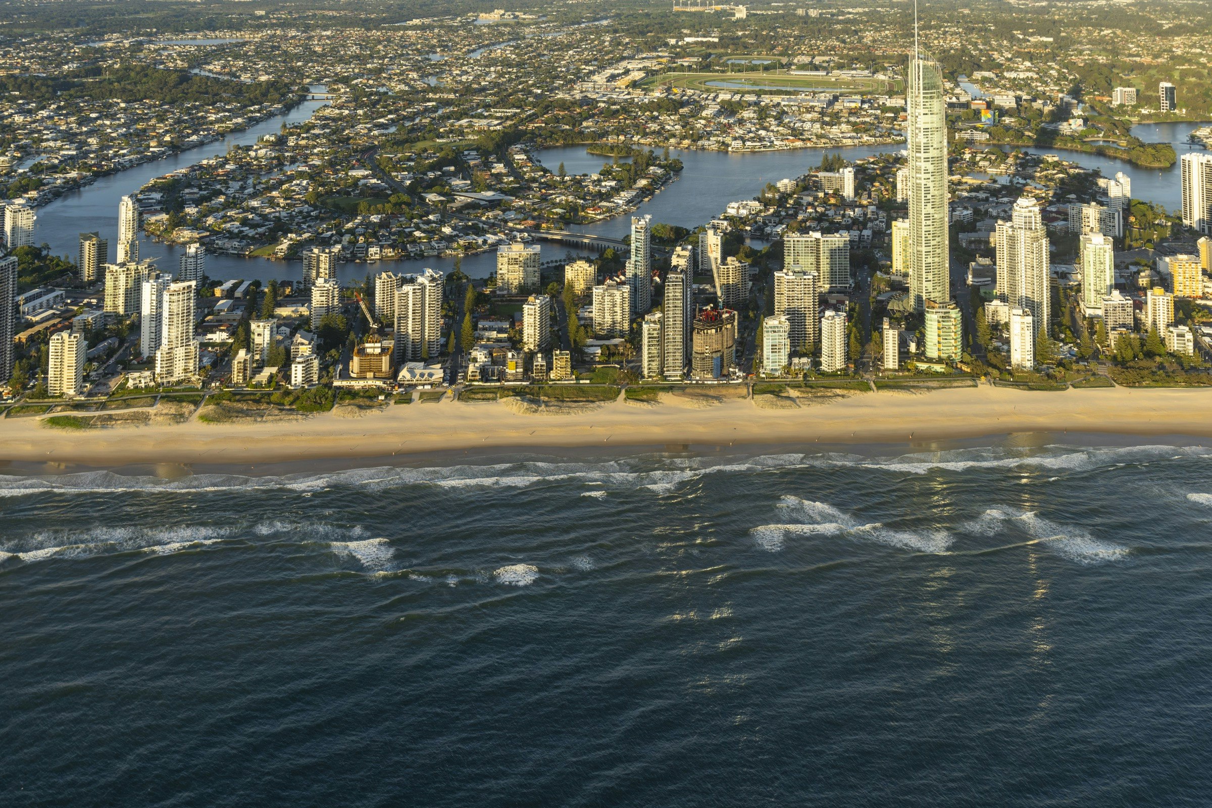 Surfers Paradise and the Gold Coast skyline seen from the ocean at sunrise
