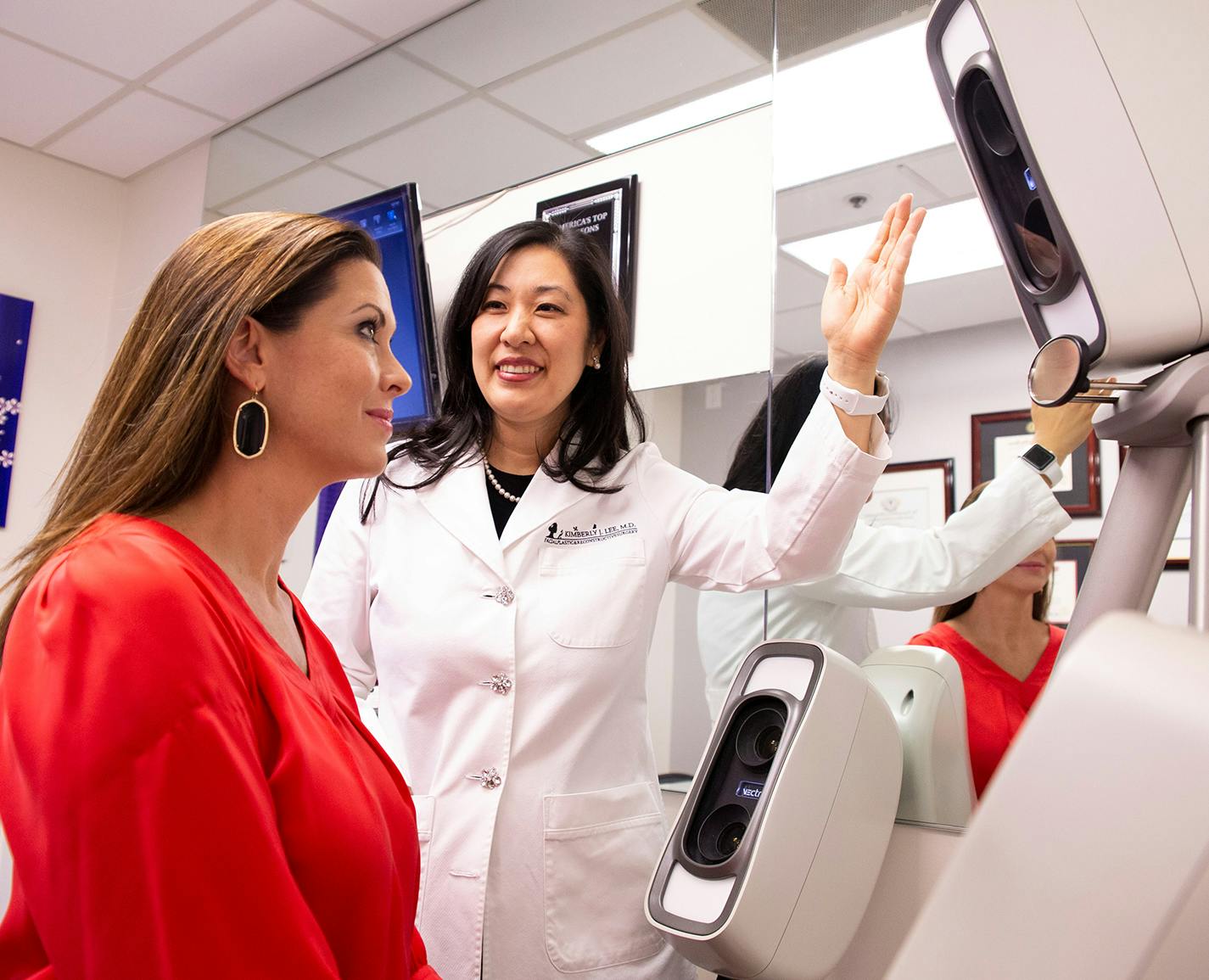 Kimberly Lee MD with a patient